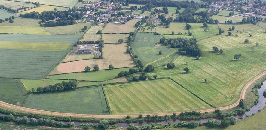 Aerial photograph of Aldborough showing the extent of the walled town and the location of the sediment core