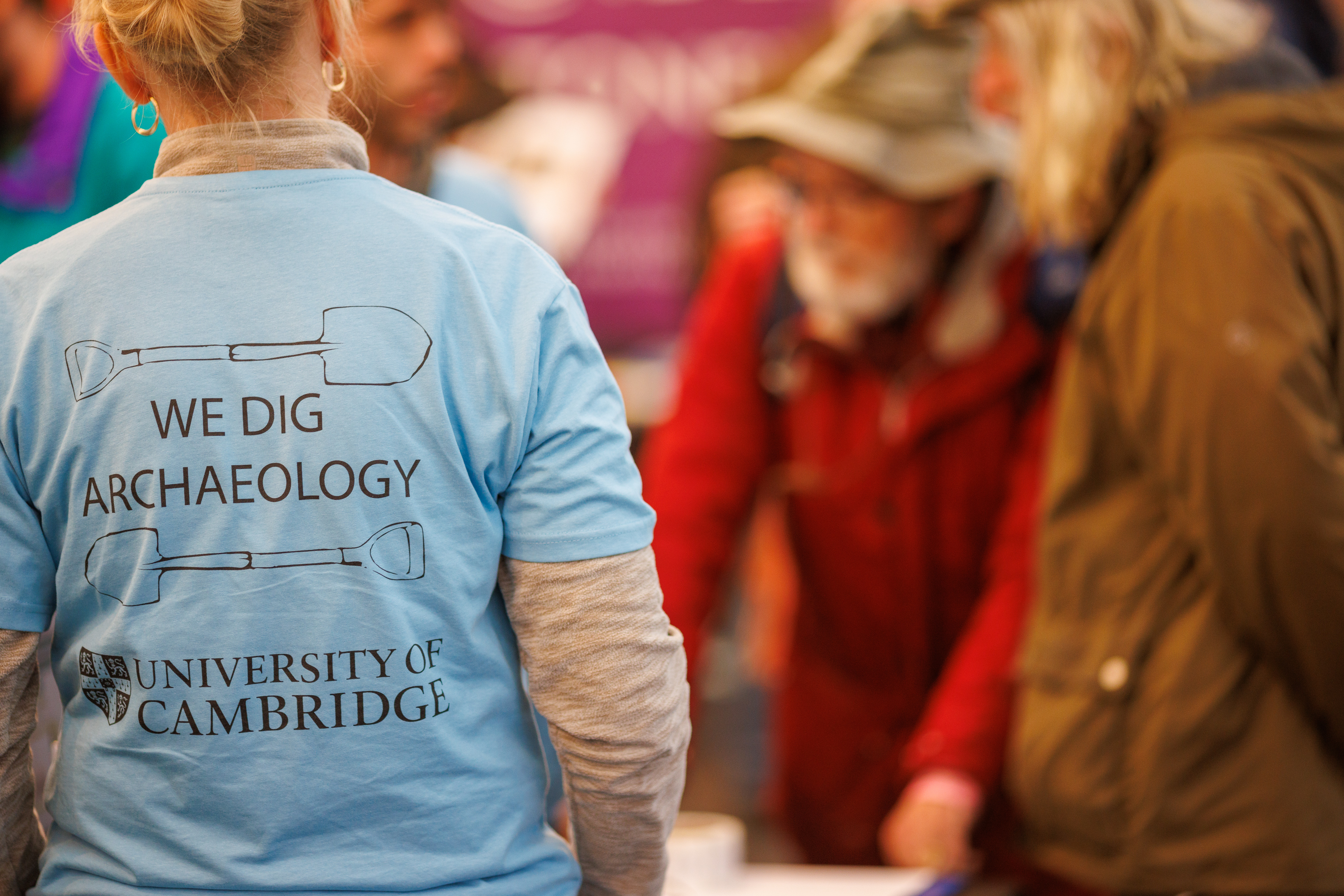 © English Heritage Trust Person wearing 'We Dig Archaeology' t-shirt