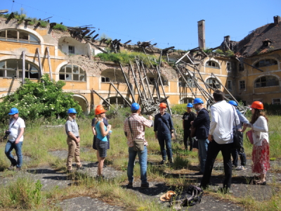 Team at the site of the former ghetto of Terezin, Czech Republic