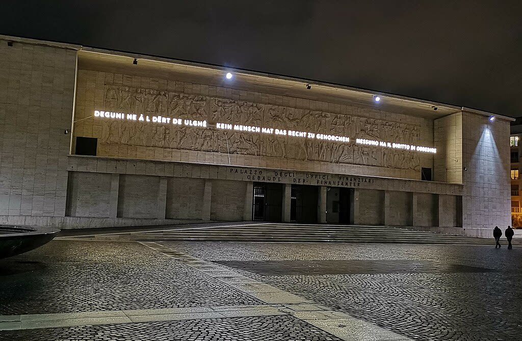 The monumental bas-relief from the fascist period bearing an illuminated quote from Hannah Arendt